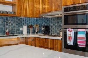 Kitchen of Casa Carlayna with coffe maker, stove, and sink in view.