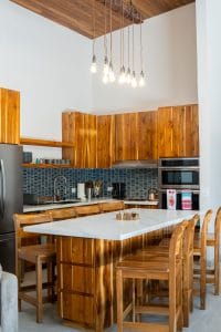Kitchen of Casa Carlayna with seats around and island ready for group brunch!