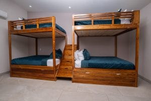 Bunk bedroom in one of our Costa Rica house rentals Casa Fenix, two bunk beds shown, room can hold 16 in total.