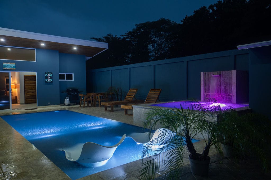 The Pool at Casa Fenix with lights on under the starry night of Playa Potrero, Guanacaste, Costa Rica