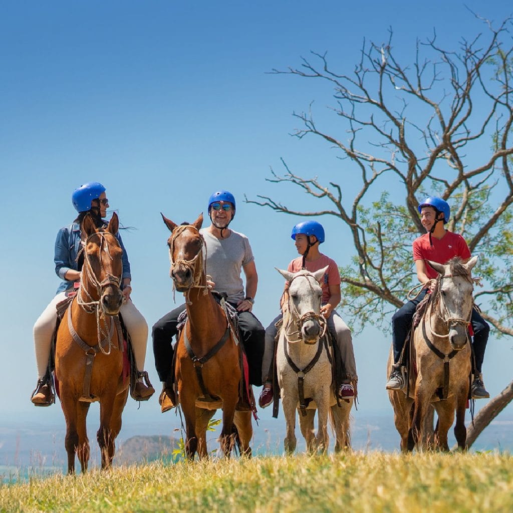 Horseback riding in the mountains of Buena Vista Adventure Park in Guanacaste, Costa Rica.