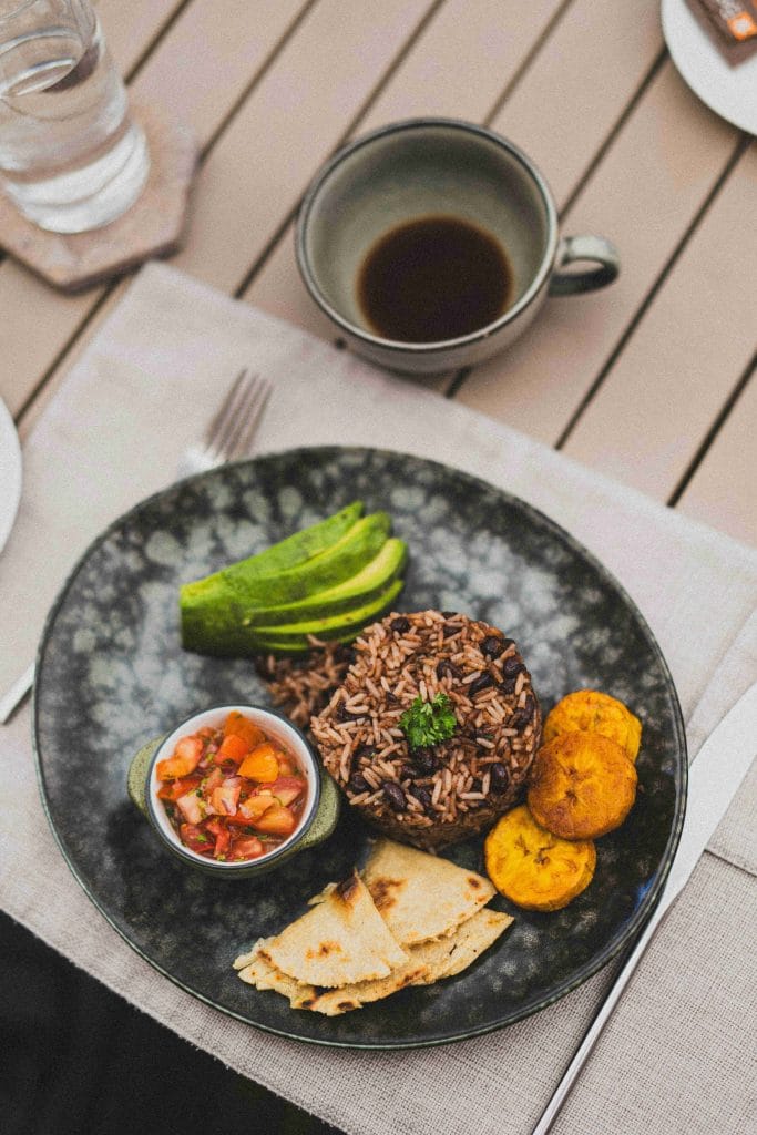 Gallo Pinto breakfast (rice and beans, avacado, platano, and tortillas
